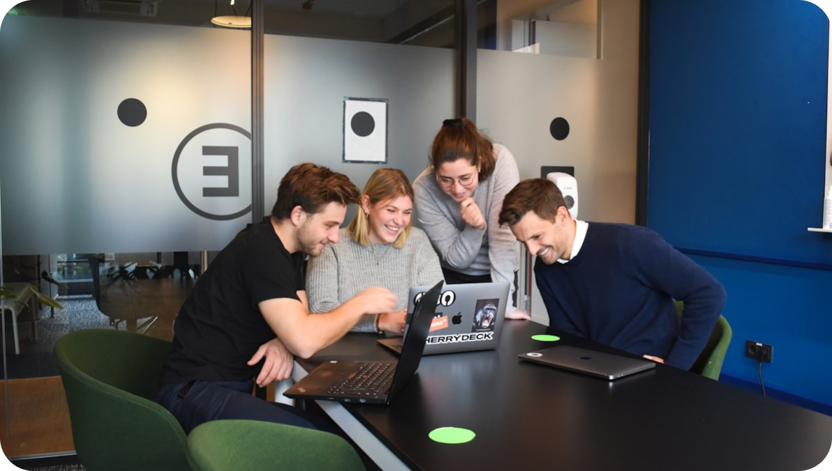 Team working on laptops